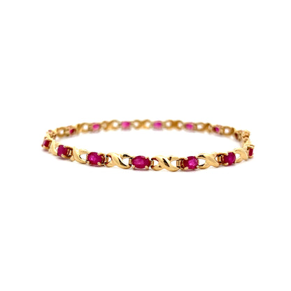 2.55 Oval Ruby Chain Bracelet in 14k Yellow Gold
