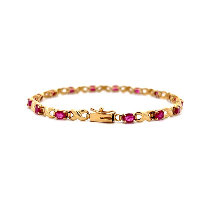 2.55 Oval Ruby Chain Bracelet in 14k Yellow Gold