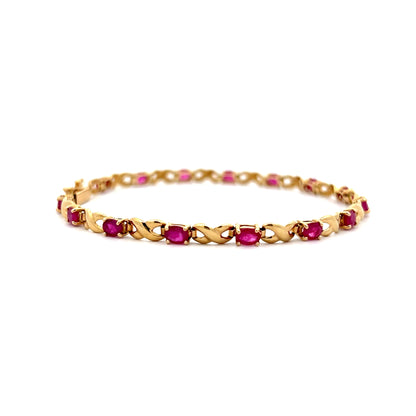2.55 Oval Ruby Chain Bracelet in 14k Yellow Gold