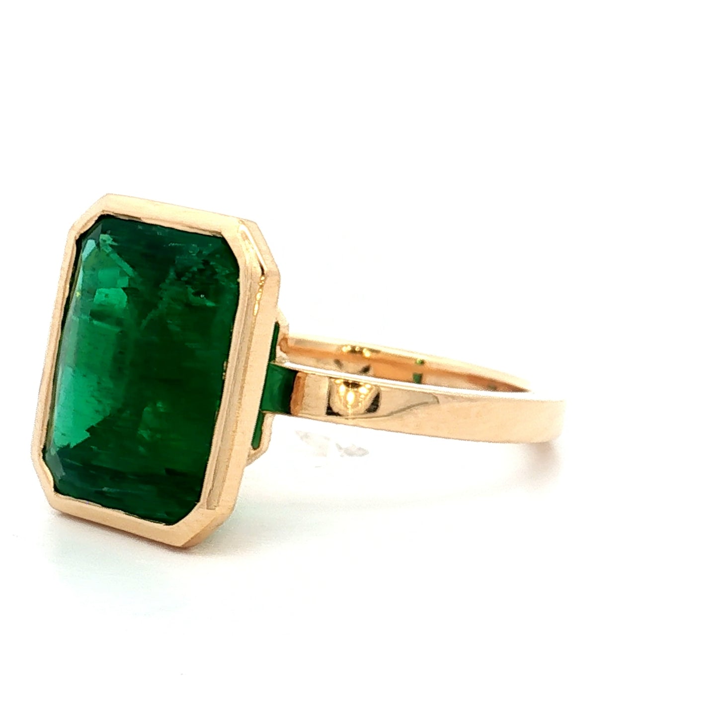 6.01 Emerald Cut Emerald in 18k Yellow Gold