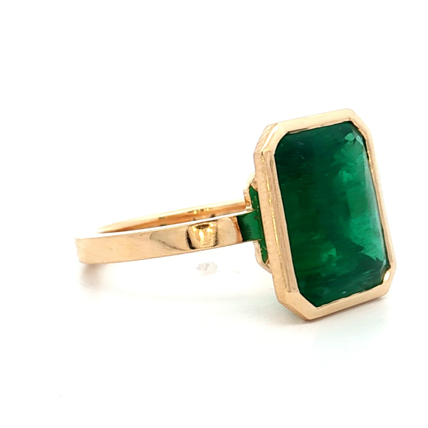 6.01 Emerald Cut Emerald in 18k Yellow Gold
