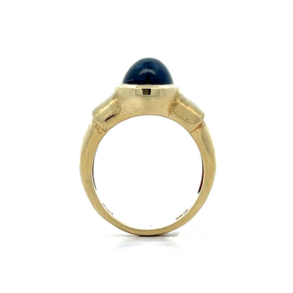4.25 Oval Cabochon Star Sapphire Ring in 14k Yellow Gold