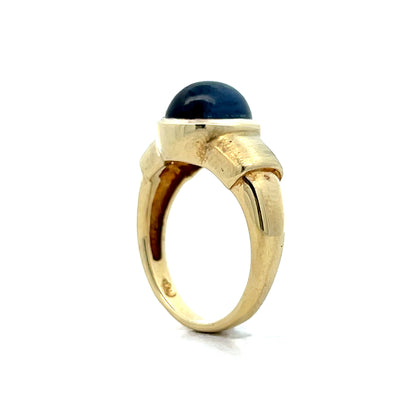 4.25 Oval Cabochon Star Sapphire Ring in 14k Yellow Gold