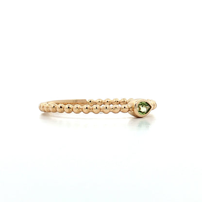 .10 Pear Cut Peridot Stacking Ring 14k Yellow Gold