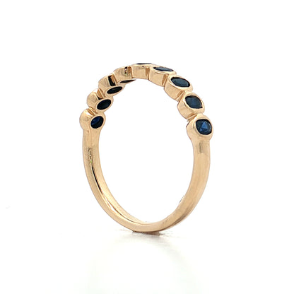 .75 Bezel Sapphire Wedding Band in 14k Yellow Gold