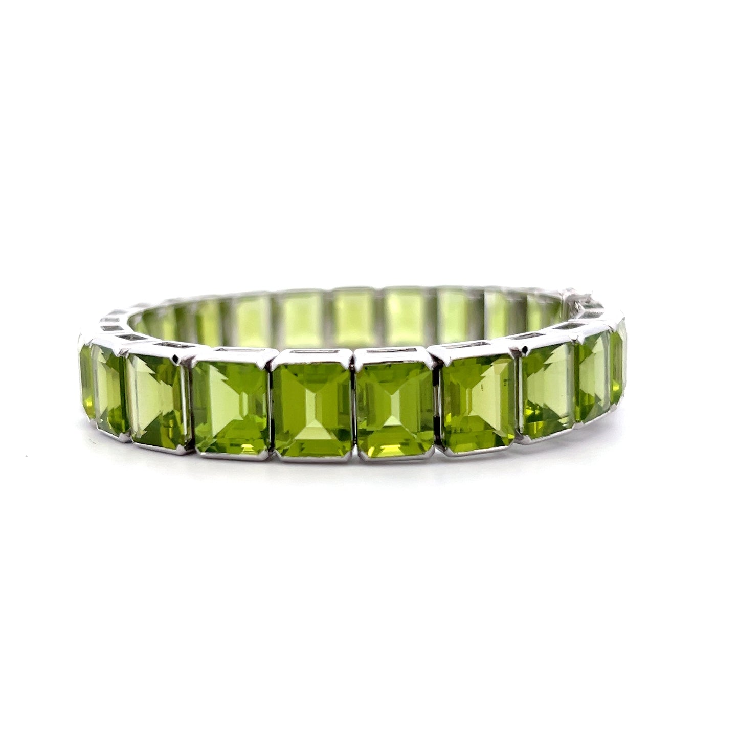57.22 Emerald Cut Peridot Line Bracelet Platinum