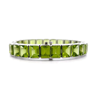 57.22 Emerald Cut Peridot Line Bracelet Platinum