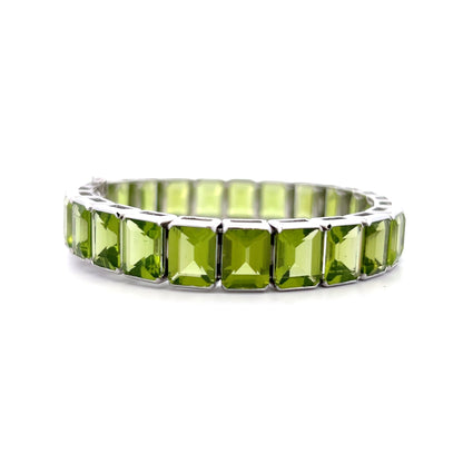 57.22 Emerald Cut Peridot Line Bracelet Platinum