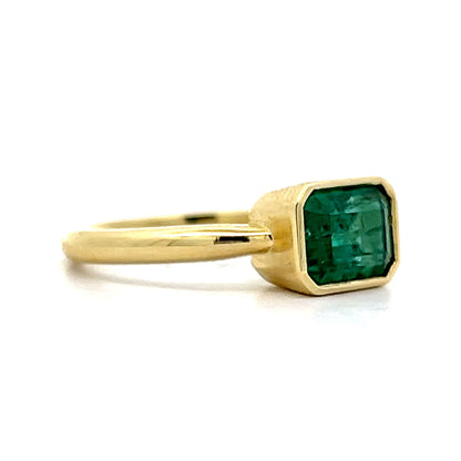 18k Yellow Gold Bezel Set Emerald ring