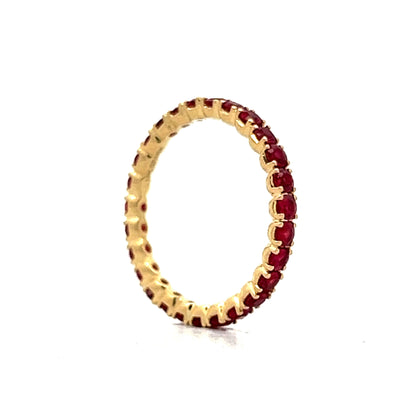 .81 Round Ruby Eternity Stacking Band in 14k Yellow Gold