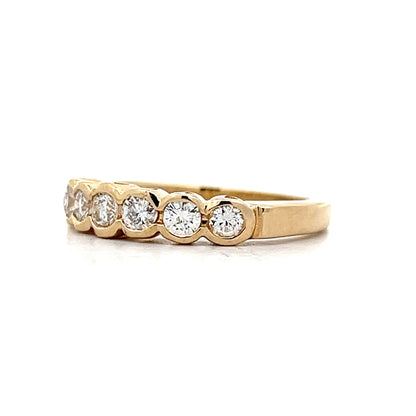 .91 Bezel Set Diamond Wedding Band in 14k Yellow Gold