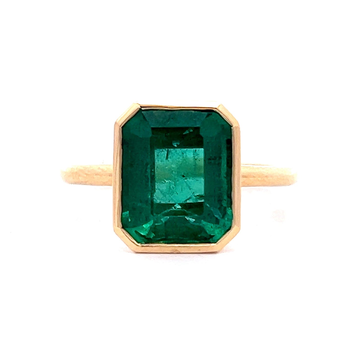 4.10 Emerald Cut Emerald Bezel Ring in 18k Yellow Gold