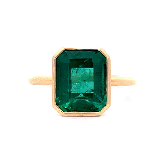 4.10 Emerald Cut Emerald Bezel Ring in 18k Yellow Gold