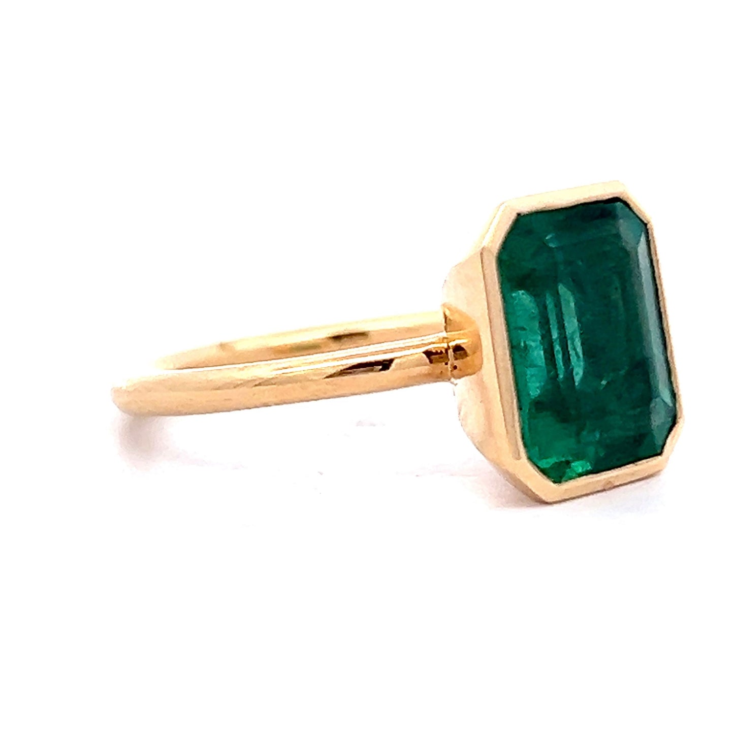 4.10 Emerald Cut Emerald Bezel Ring in 18k Yellow Gold