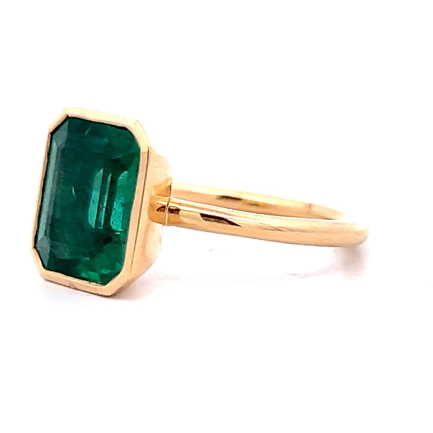 4.10 Emerald Cut Emerald Bezel Ring in 18k Yellow Gold