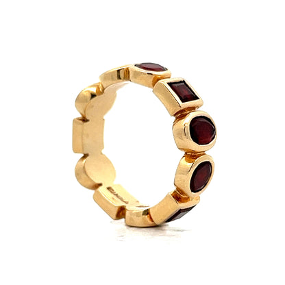 1.56 Bezel Garnet Eternity Band in 14k Yellow Gold