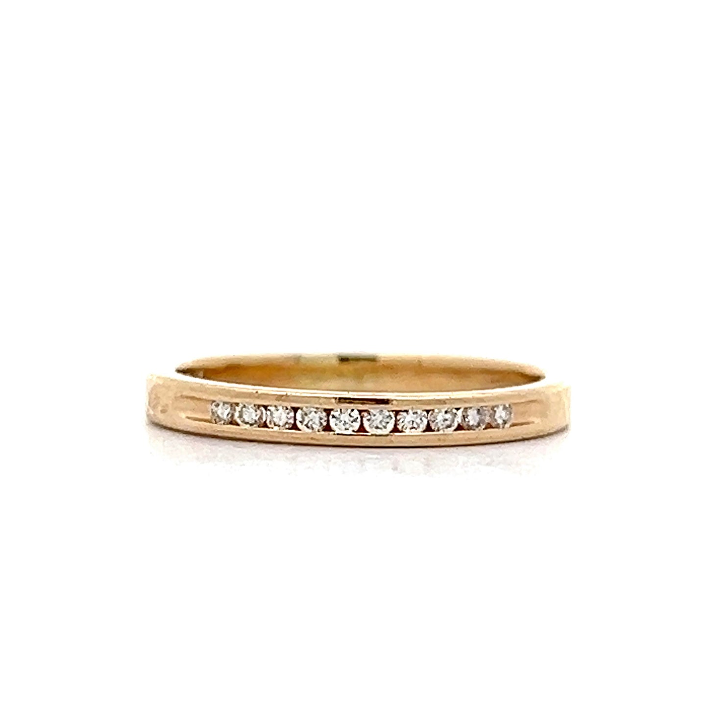 .09 Round Brilliant Diamond Wedding Band in 14k Yellow Gold