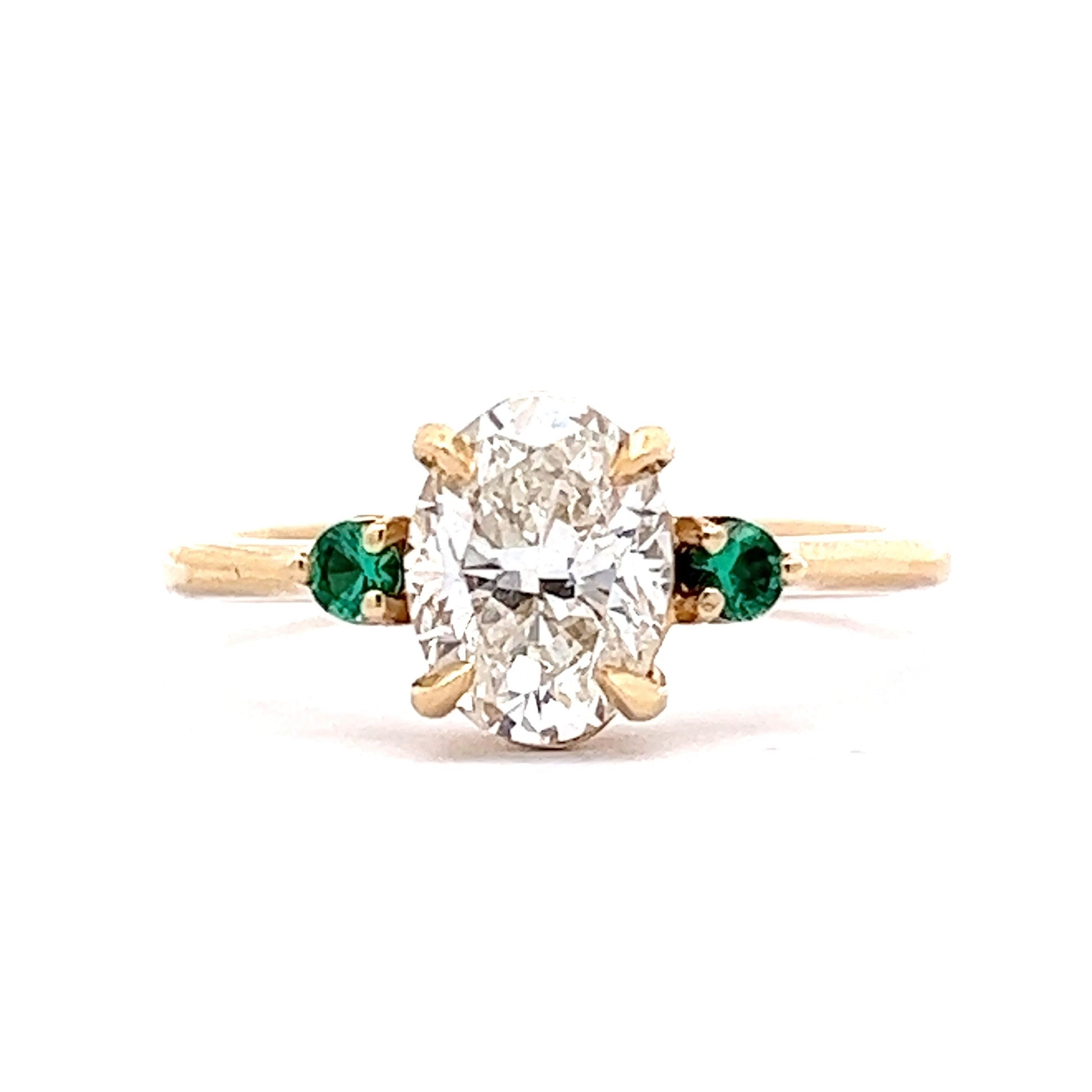 Oval Cut Diamond Engagement Ring w/ Emerald Accents