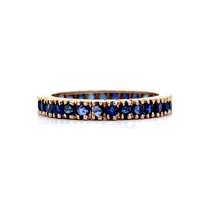 Round Cut Sapphire Eternity Wedding Band in 14k Yellow Gold