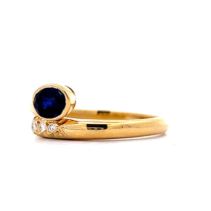 Sapphire & Diamond Bypass Ring in 18k Yellow Gold
