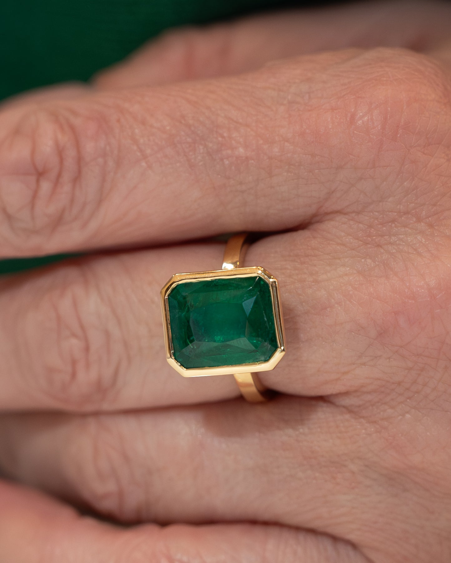 6.01 Emerald Cut Emerald in 18k Yellow Gold