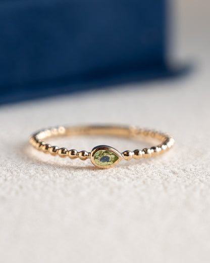 .10 Pear Cut Peridot Stacking Ring 14k Yellow Gold