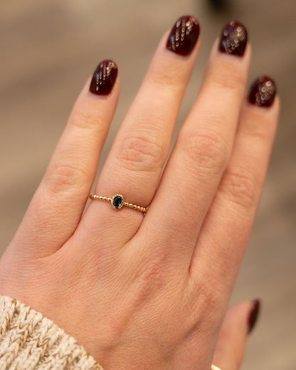 .15 Oval Blue Topaz Stacking Ring 14k Yellow Gold