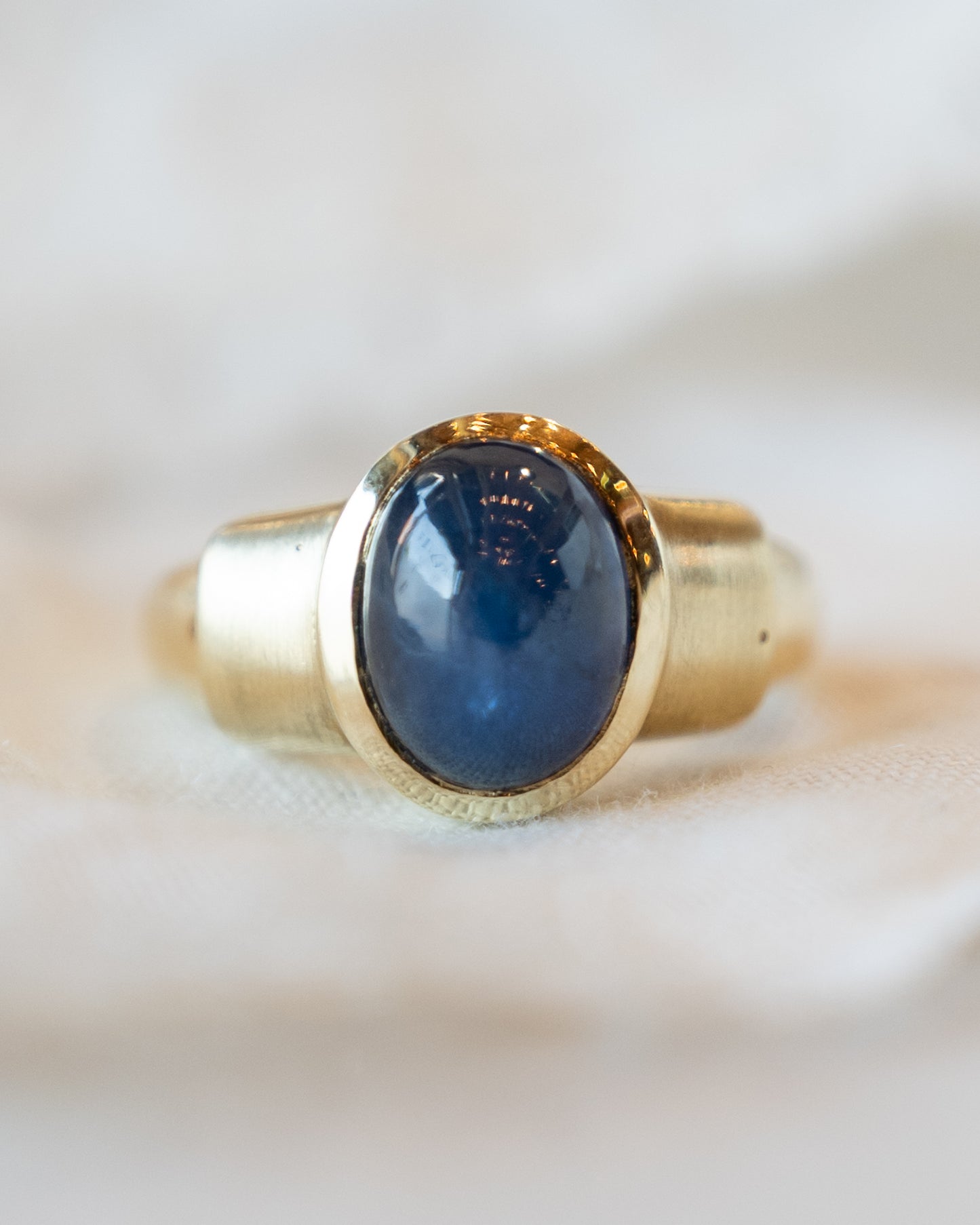 4.25 Oval Cabochon Star Sapphire Ring in 14k Yellow Gold