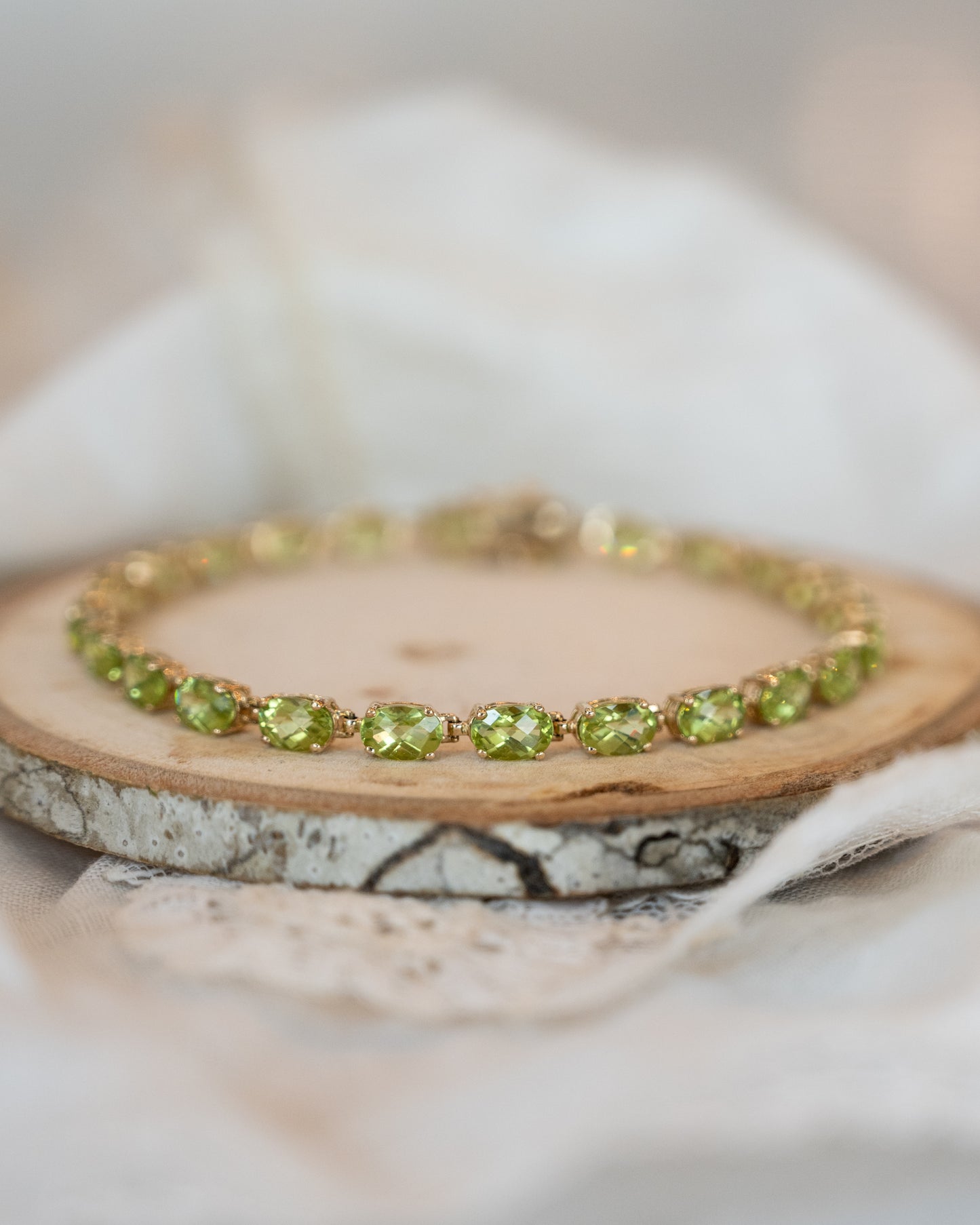 11.52 Oval Peridot Tennis Bracelet in 14k Yellow Gold