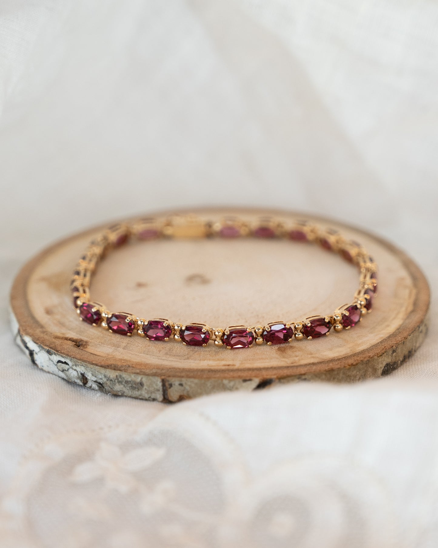 12.10 Rhodolite Garnet Tennis Bracelet in 14k