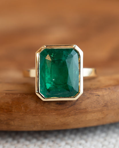 6.01 Emerald Cut Emerald in 18k Yellow Gold