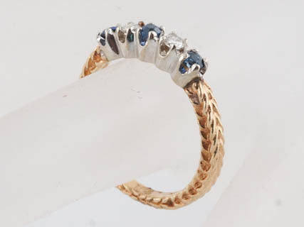Modern Five Stone Diamond and Sapphire Cocktail Ring in 14k Yellow GoldComposition: 14 Karat Yellow Gold Total Diamond Weight: .14ct Total Gram Weight: 3.52 g