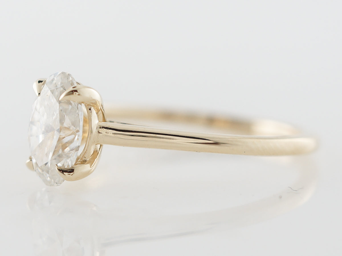 Solitaire Oval Diamond Engagement Ring in Yellow Gold