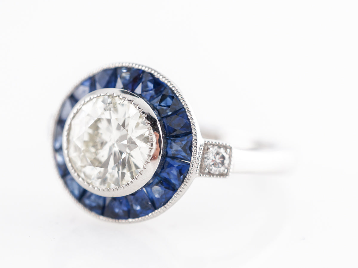 1 Carat Diamond & Sapphire Halo Engagement Ring in Platinum