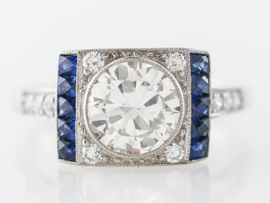 Bezel Diamond & Sapphire Engagement Ring in Platinum