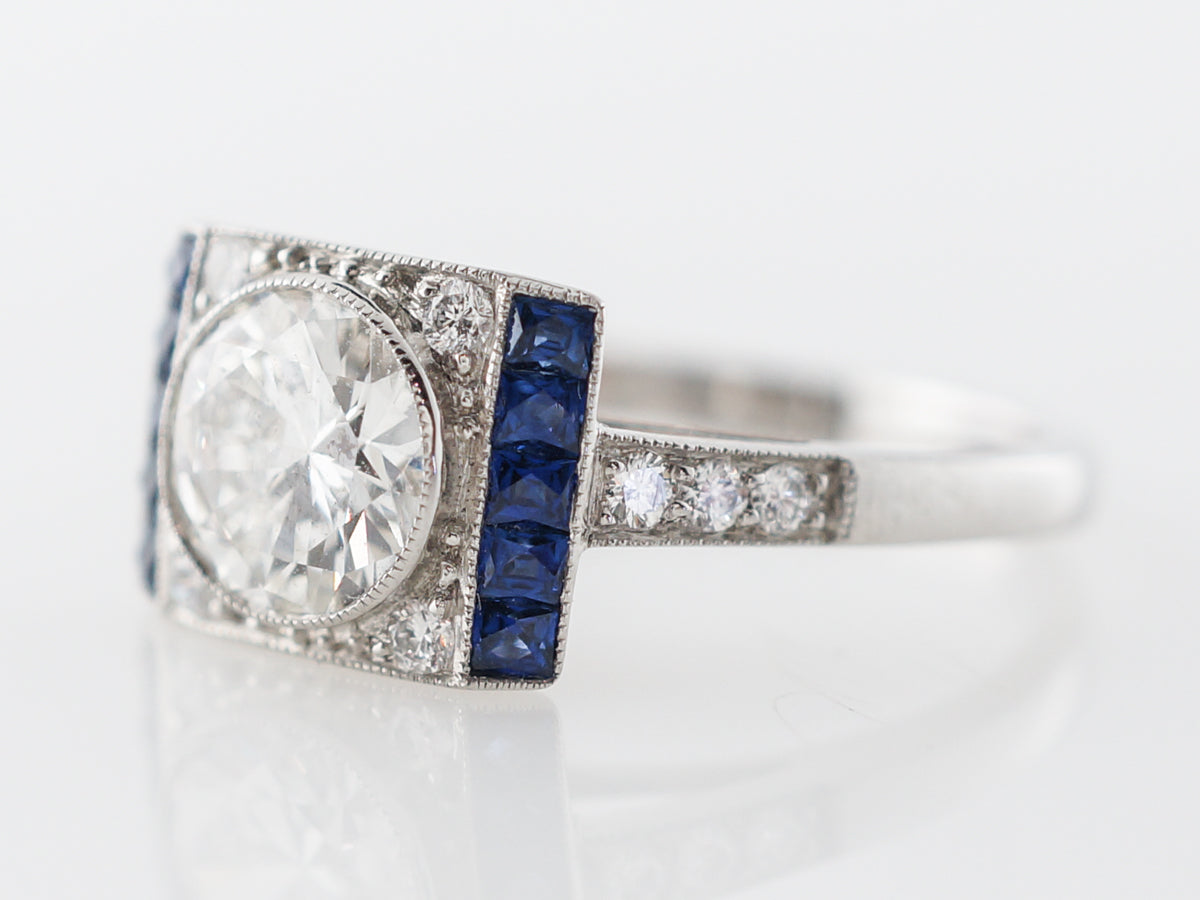 Bezel Diamond & Sapphire Engagement Ring in Platinum