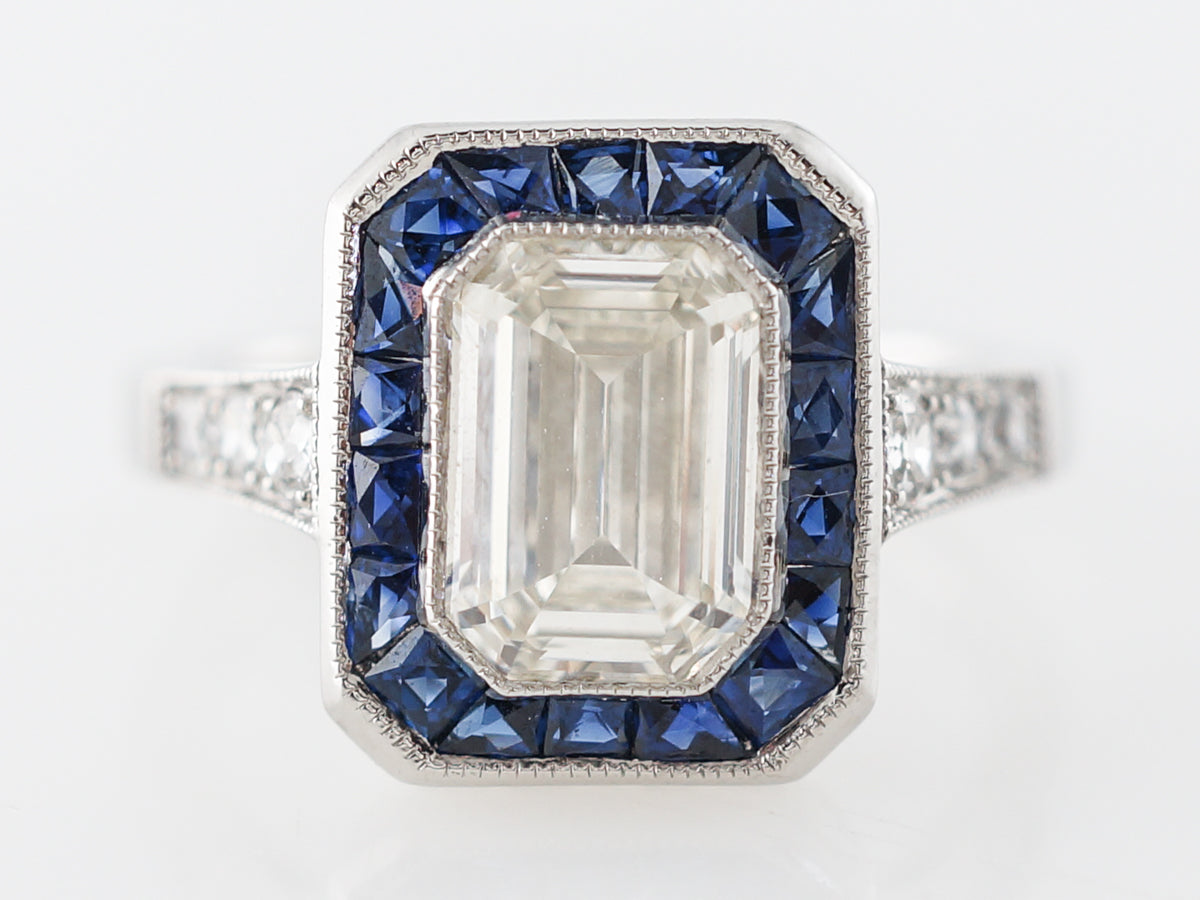 Halo Engagement Ring w/ Emerald Cut Diamond in Platinum