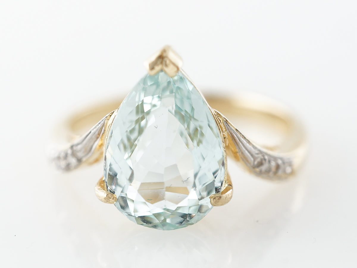 Pear Cut Aquamarine & Diamond Ring in Yellow Gold