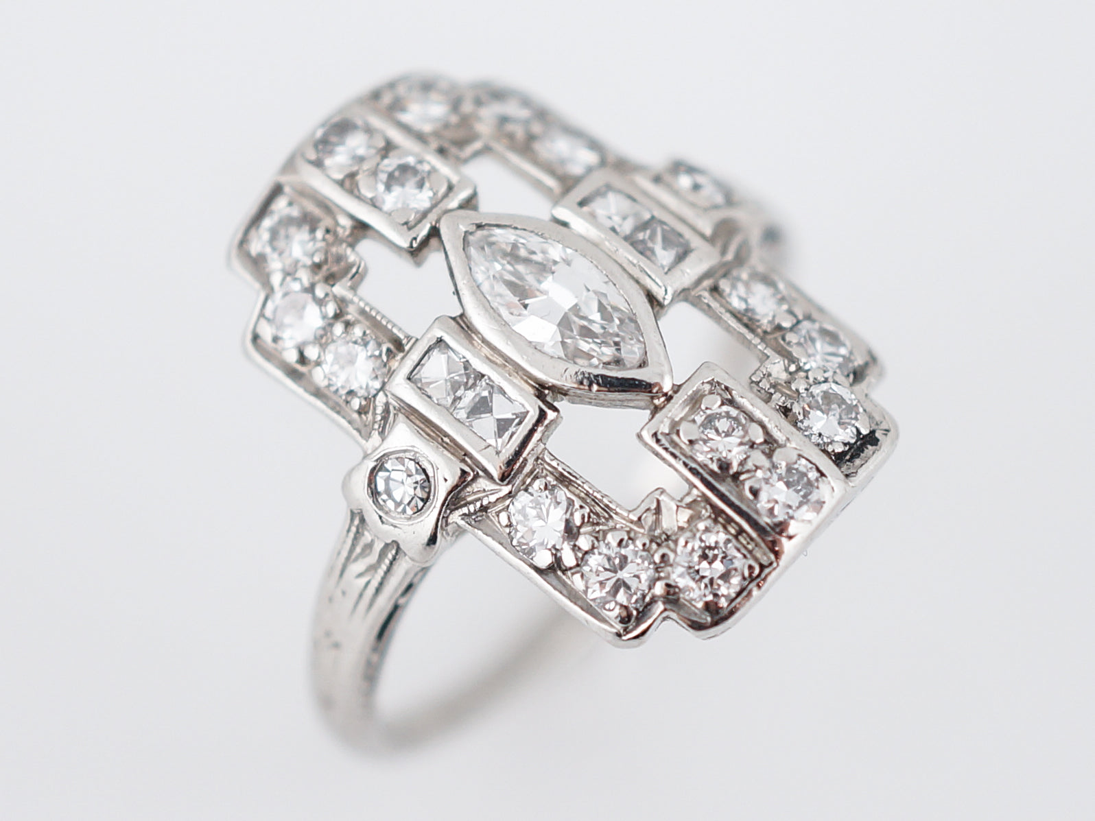 Antique Right Hand Ring Edwardian .61 Old Cut Diamonds in PlatinumComposition: Platinum Total Diamond Weight: .61ct Total Gram Weight: 4.30 g