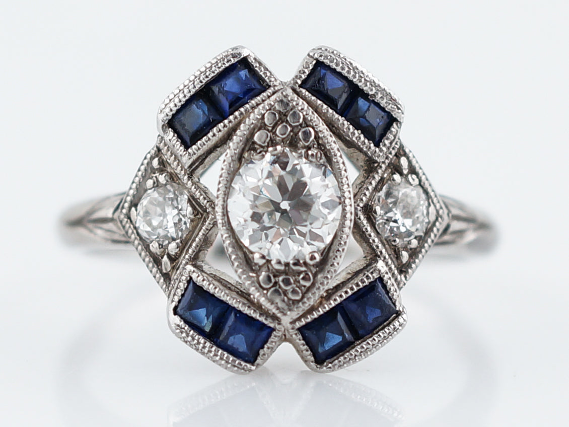 Vintage Platinum Art Deco Diamond & Sapphire RingComposition: Platinum Total Diamond Weight: .55ct Total Gram Weight: 3.30 g