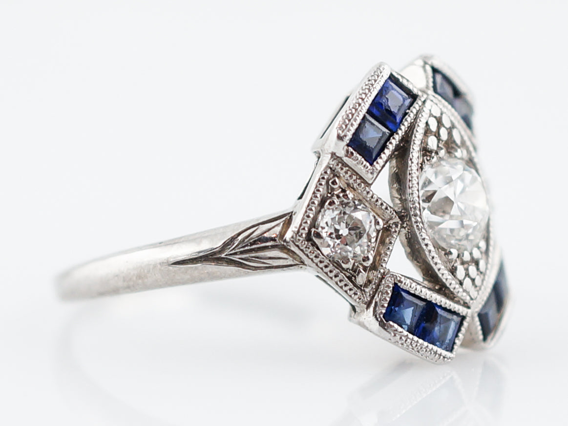Vintage Platinum Art Deco Diamond & Sapphire RingComposition: Platinum Total Diamond Weight: .55ct Total Gram Weight: 3.30 g
