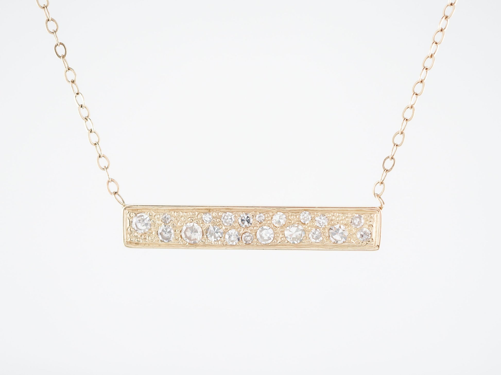 Modern Bar Necklace .80 Single Cut Diamonds in 14k Yellow GoldComposition: Platinum Total Diamond Weight: .80ct Total Gram Weight: 2.70 g