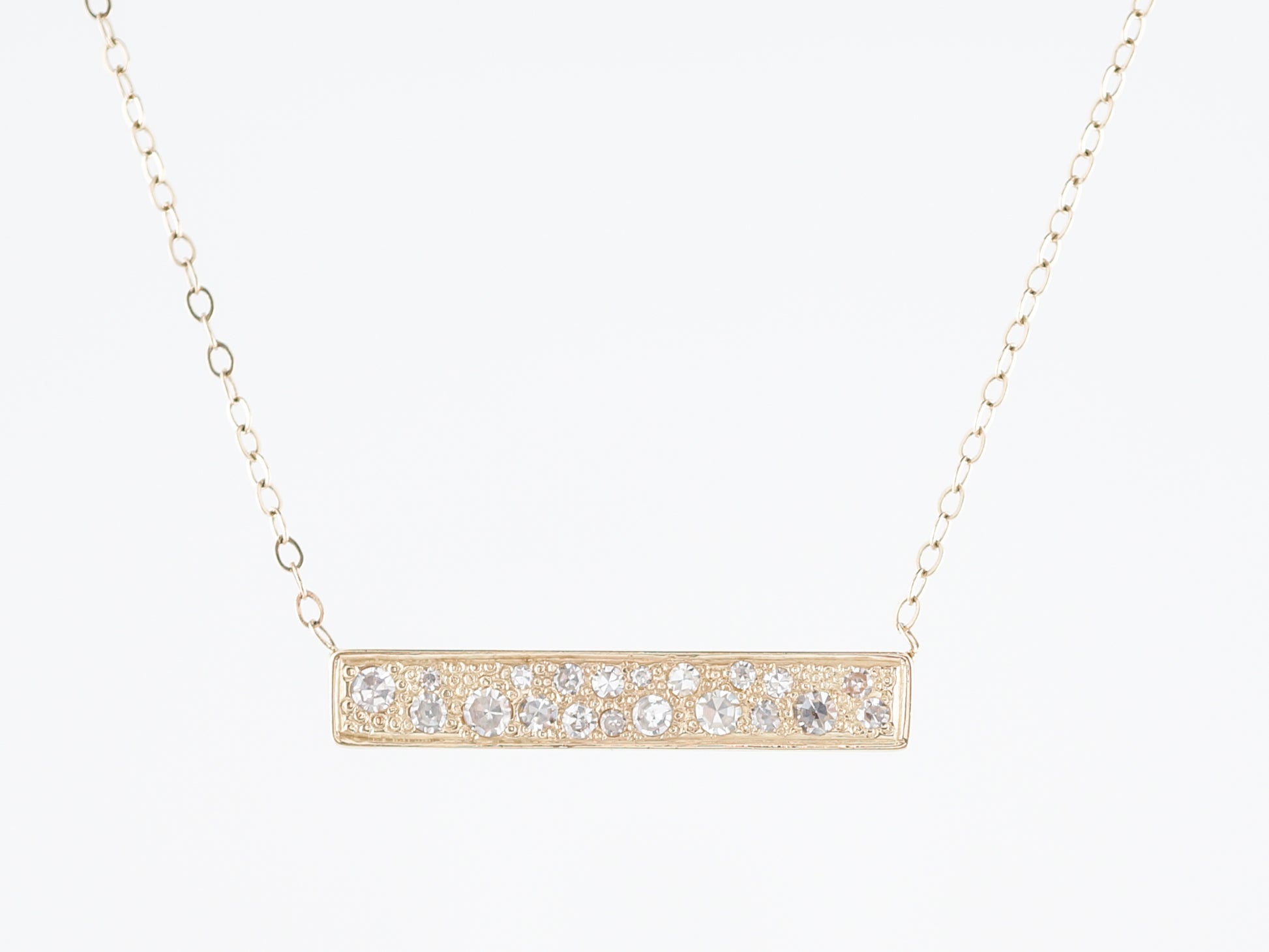 Modern Bar Necklace .80 Single Cut Diamonds in 14k Yellow GoldComposition: Platinum Total Diamond Weight: .80ct Total Gram Weight: 2.70 g