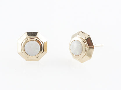 Opal Stud Earrings in 14k Yellow Gold