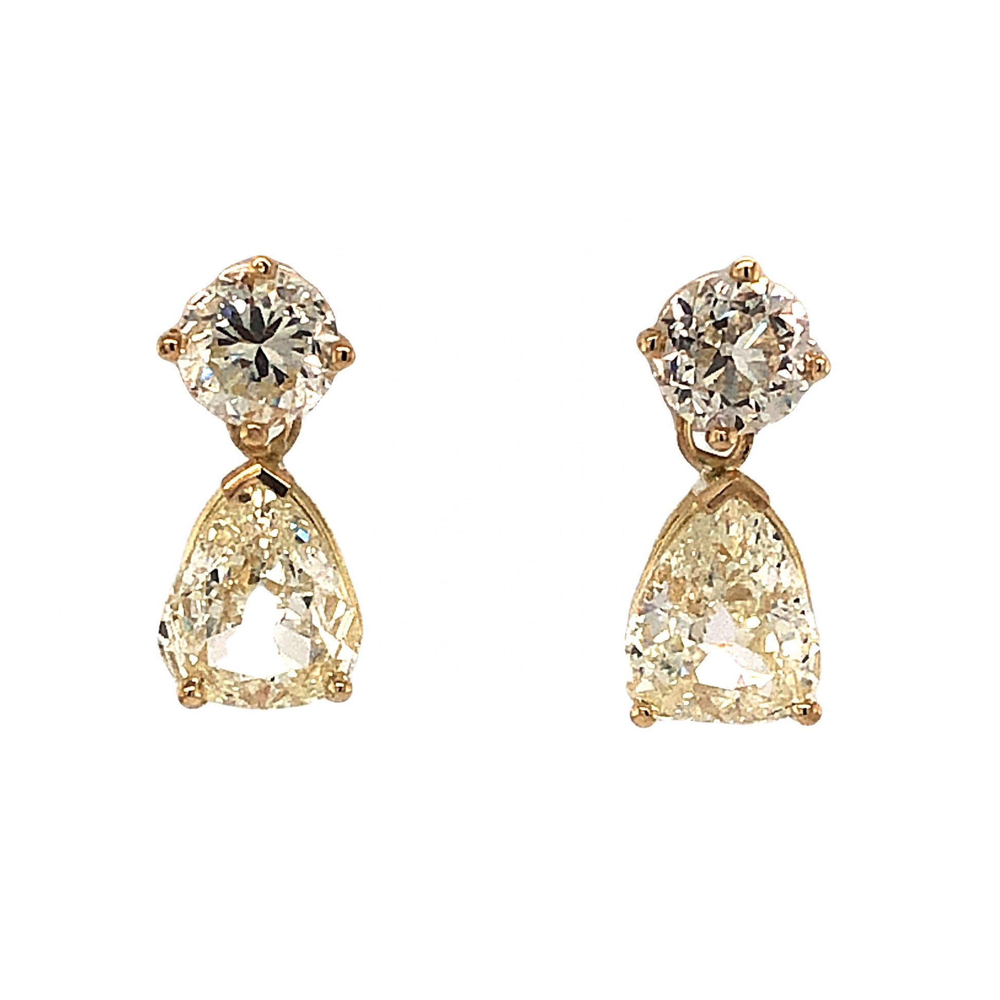 Fancy Yellow Pear Cut Diamond Earrings in 18k Yellow GoldComposition: 18 Karat Yellow GoldTotal Diamond Weight: 4.51 ctTotal Gram Weight: 3.9 gInscription: 18k