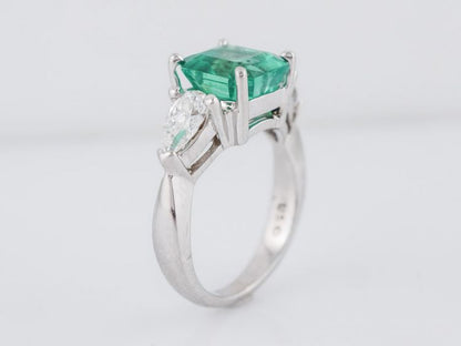 Three Stone Emerald & Diamond Engagement Ring in 18k