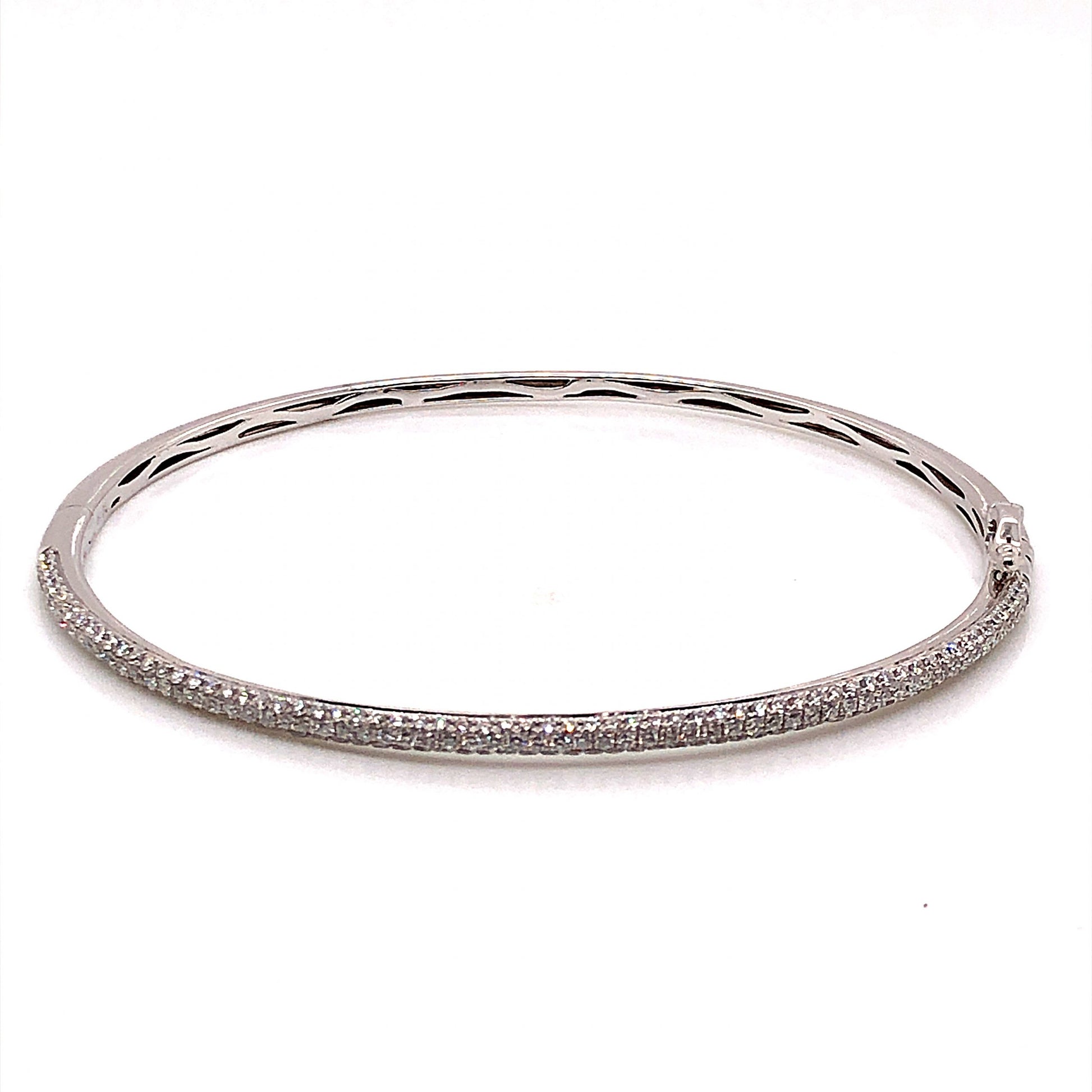 1.10 Diamond Bangle Bracelet in 18k White GoldComposition: PlatinumTotal Diamond Weight: 1.10 ctTotal Gram Weight: 8.0 gInscription: 18k,  BL