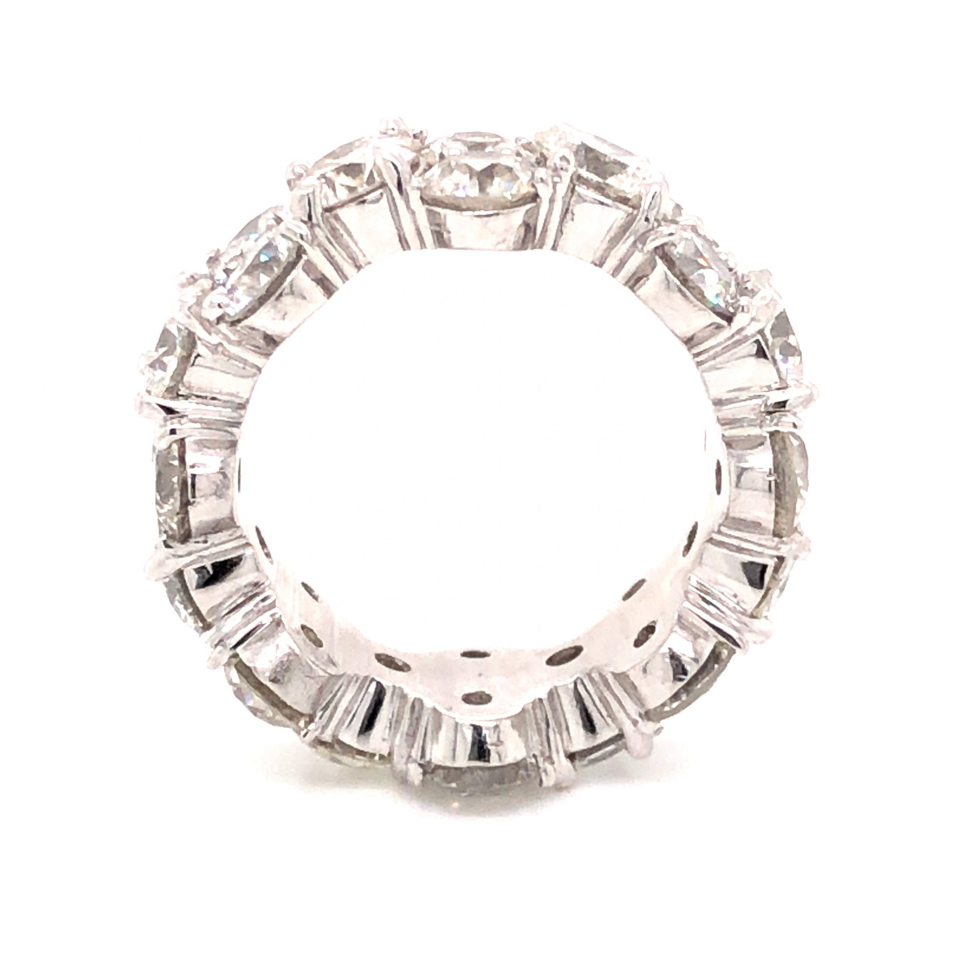 9.92 Round Brilliant Cut Diamond Eternity Ring in PlatinumComposition: PlatinumRing Size: 6Total Diamond Weight: 9.92 ctTotal Gram Weight: 14.3 g