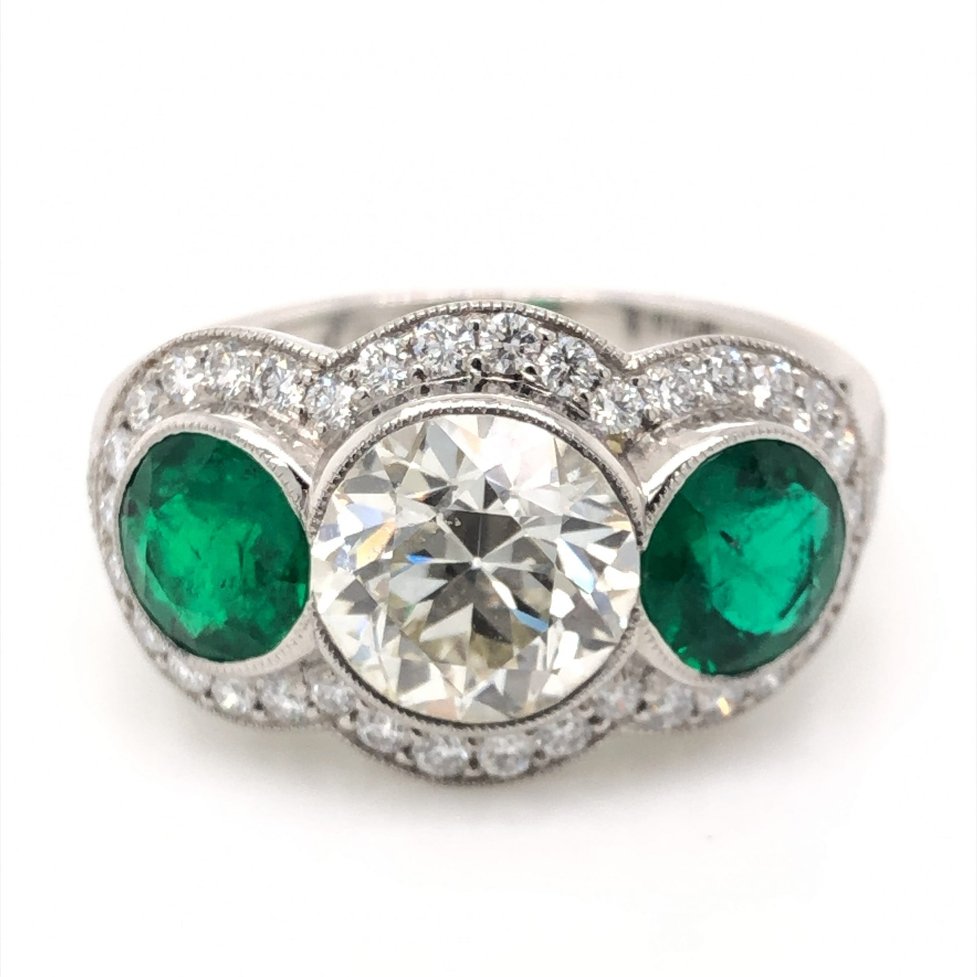 1.81 Diamond & Emerald Three Stone Ring in Platinum