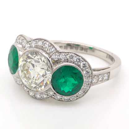 1.81 Diamond & Emerald Three Stone Ring in Platinum